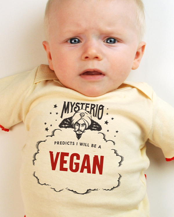 A baby wearing wrybaby's funny fortune teller t-shirt that says 'Mysterio Predicts I will be a Vegan'