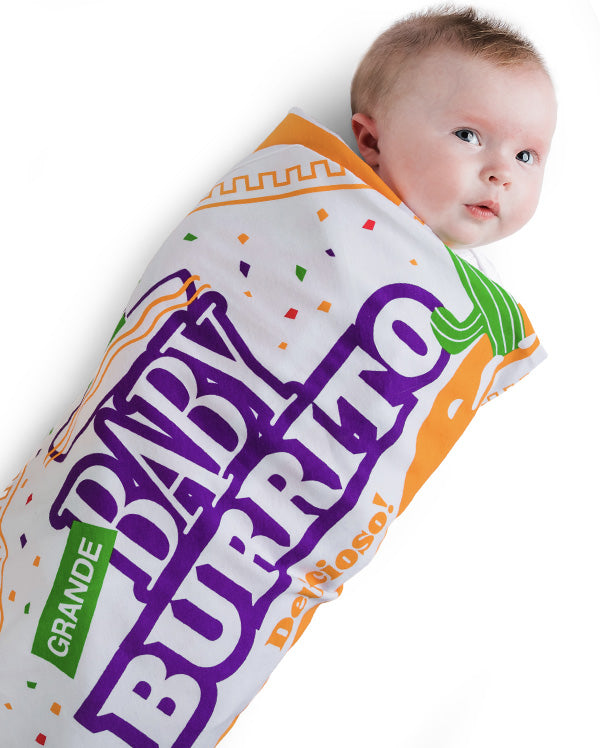 A cute baby in the Baby Burrito swaddling blanket by Wrybaby. The cute baby blanket that looks like a burrito wrapper.