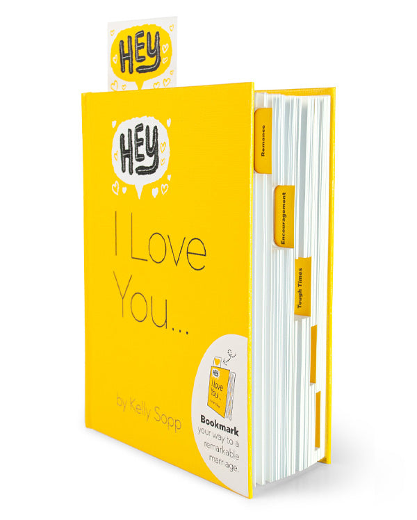 The relationship guide book, 'Hey, I Love You...' has 5 tabs for Romance, Encouragement, Tough Times, Disagreements, and even apologies