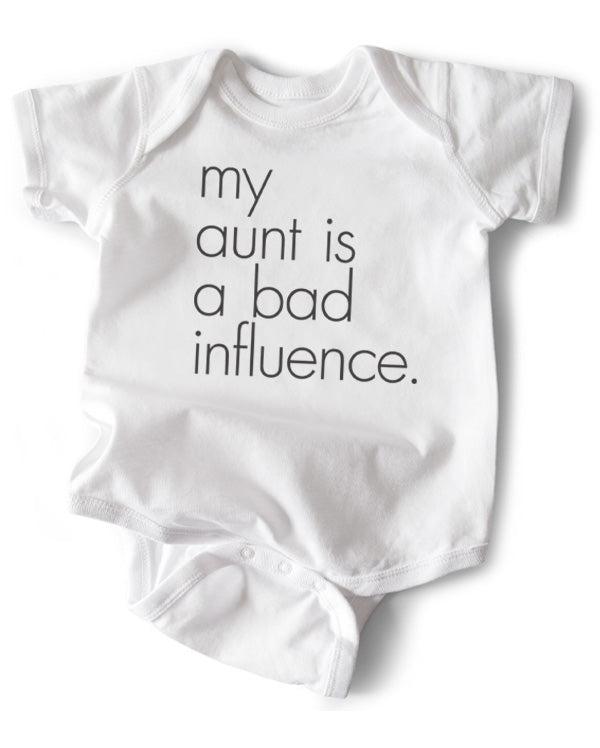 A white cotton funny onesie made by wrybaby with 'My Aunt is a Bad Influence' printed on the front in a nice design