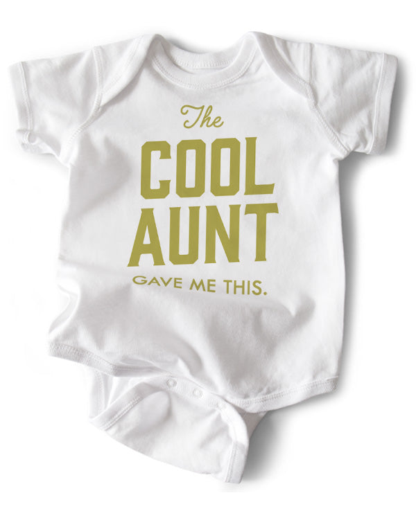 A white cotton funny onesie made by wrybaby with 'The Cool Aunt Gave Me This' printed on the front in a nice design