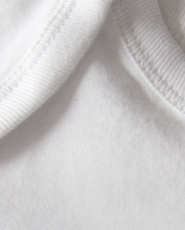 Close up of wrybaby's funny 'Silently Judging You' onesie showing the lap-shoulder neckline